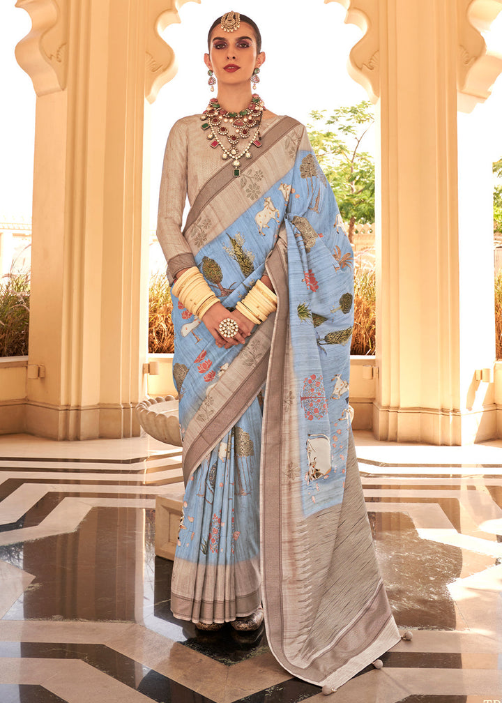 Soft Blue Khadi Printed Raw Silk Saree draped on a mannequin