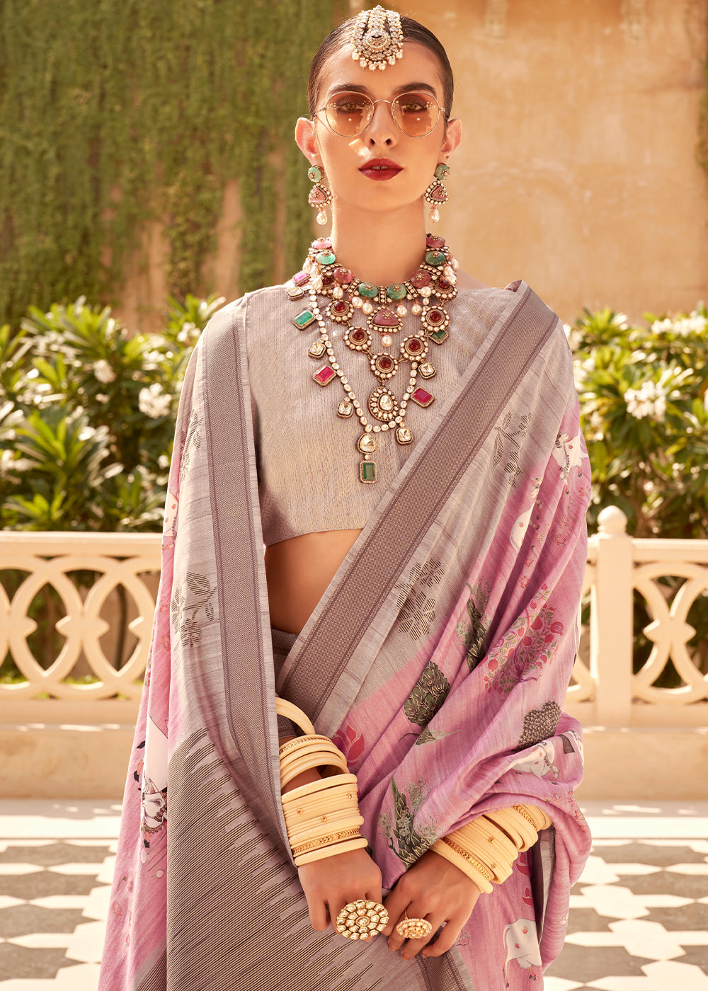 Traditional Indian saree in carmine pink with khadi print and raw silk fabric