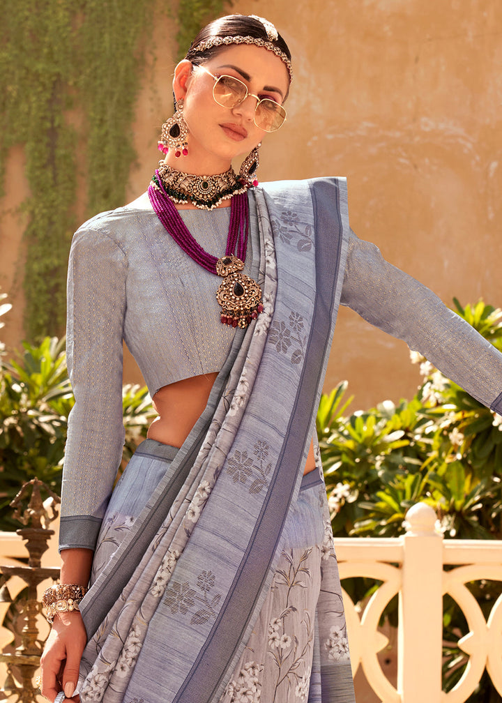  Beautiful light blue Khadi printed raw silk saree with intricate patterns and delicate embroidery