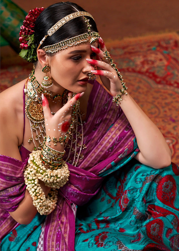 Beautiful cerulean blue traditional patola printed silk saree with intricate detailing