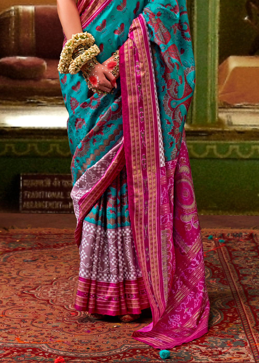 Beautiful cerulean blue traditional patola printed silk saree with intricate designs