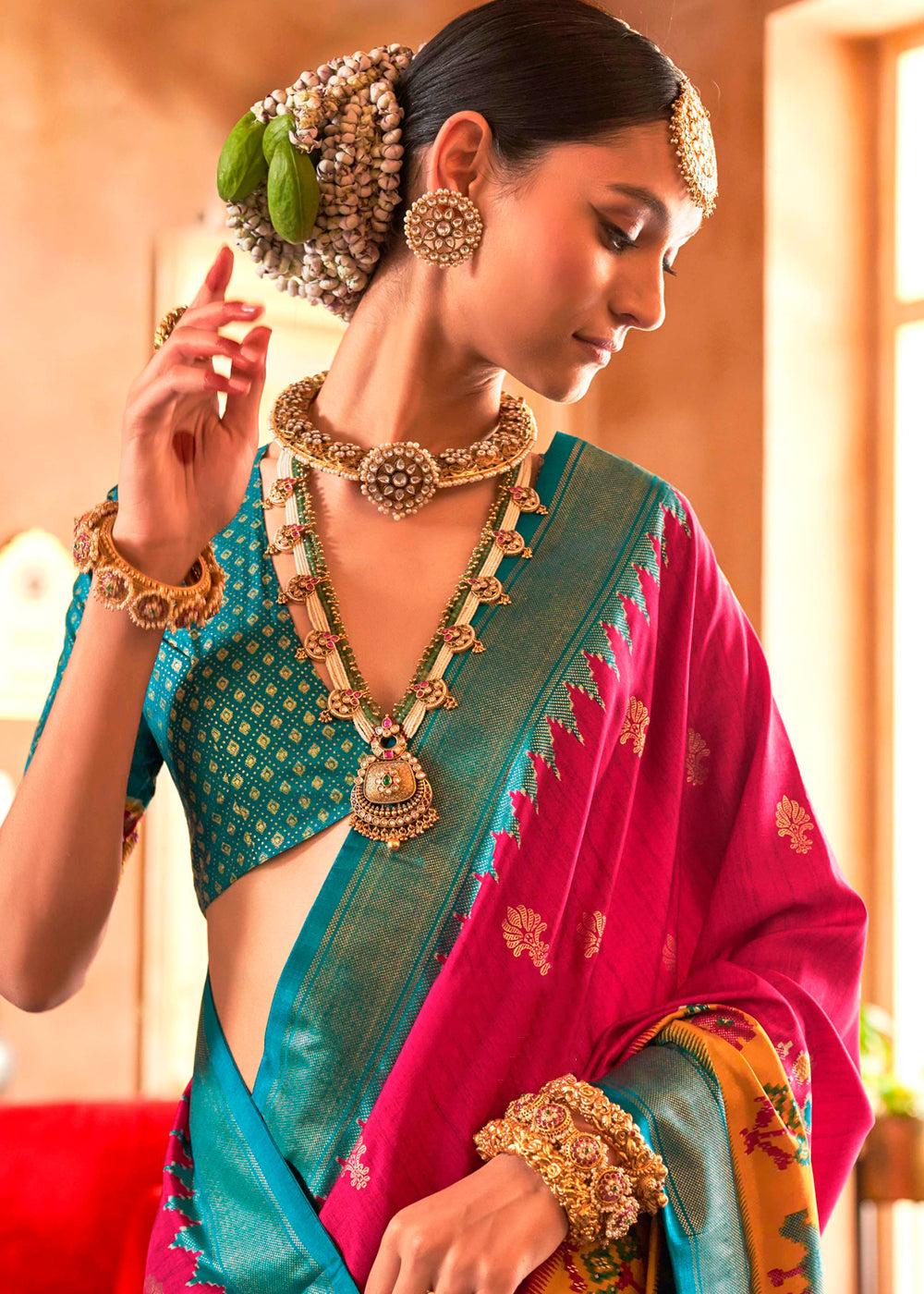 Elegant traditional Indian saree in vibrant magenta pink color