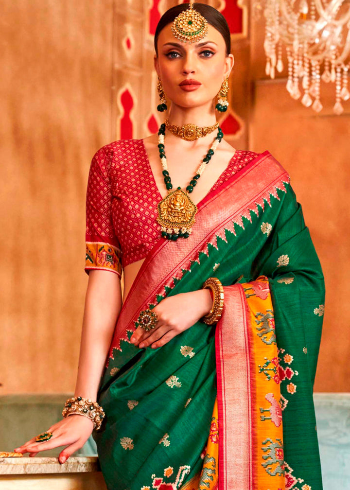 Elegant and luxurious Forest Green Patola Silk Saree with stunning Sambhal Puri Print