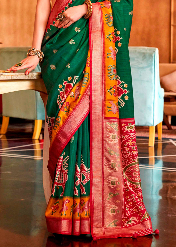 Traditional Indian saree in rich forest green silk with beautiful print