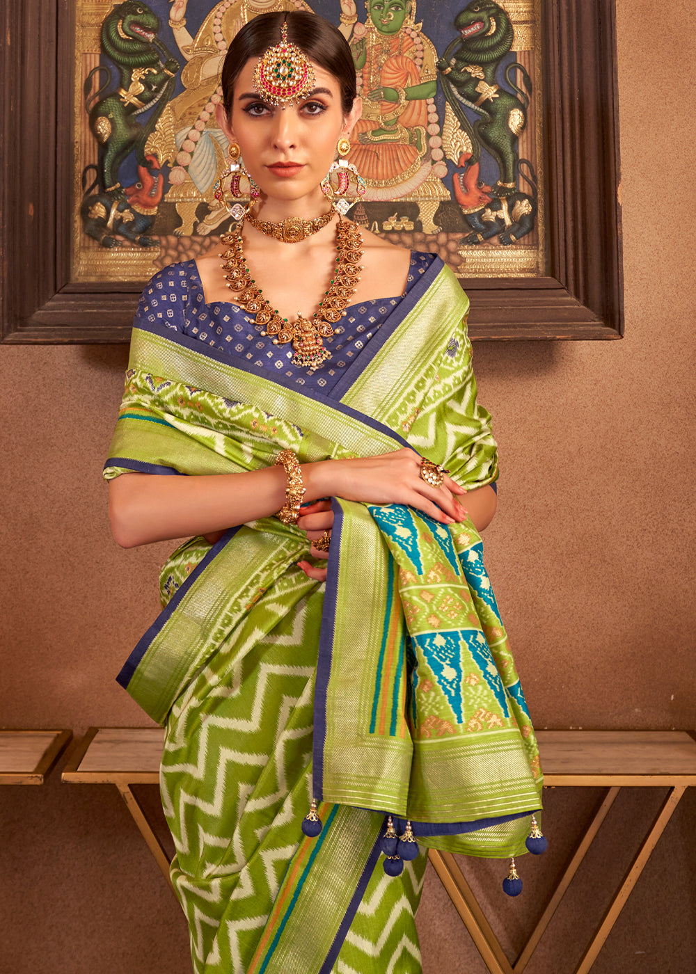 Beautiful and elegant Venom Green Patola Printed Silk Saree with Contrast Blouse