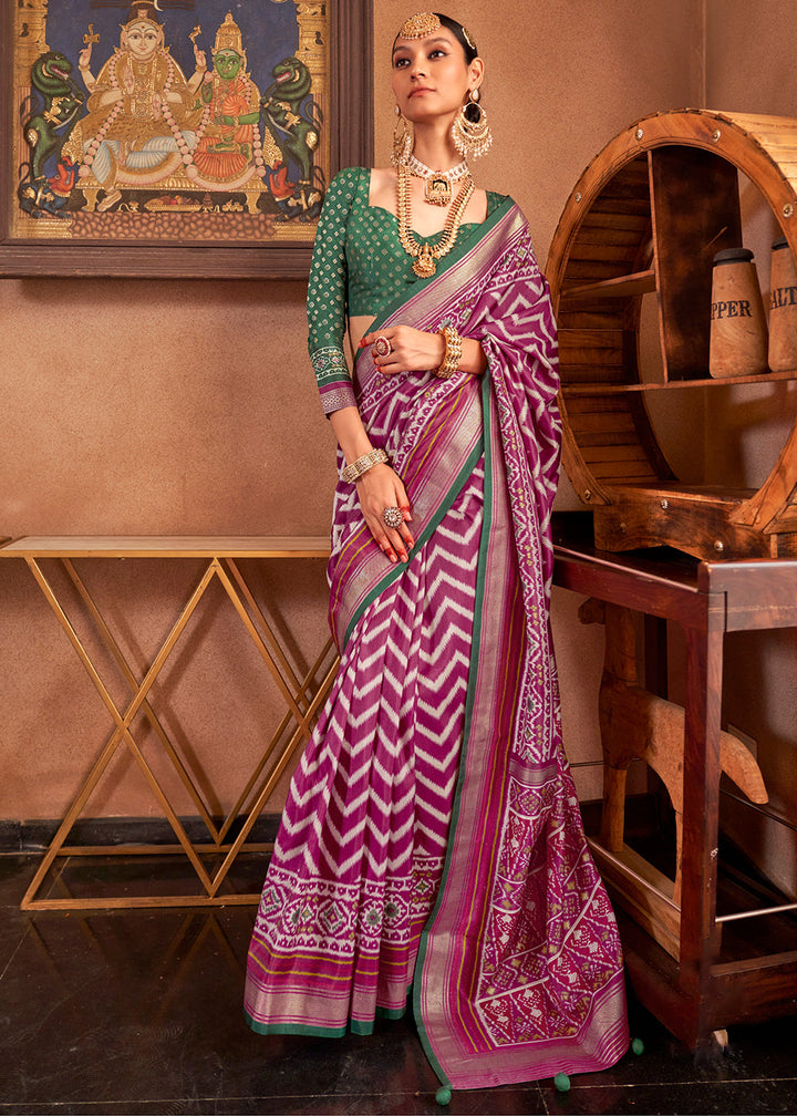 Shades of Purple Patola Printed Silk Saree with Contrast Blouse draped on mannequin