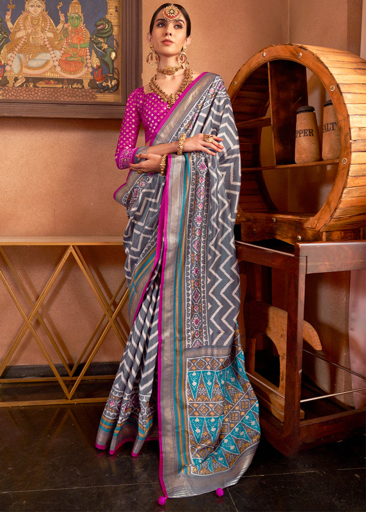 Steel Grey Patola Printed Silk Saree with Contrast Blouse, a traditional Indian outfit with intricate design and elegant color combination