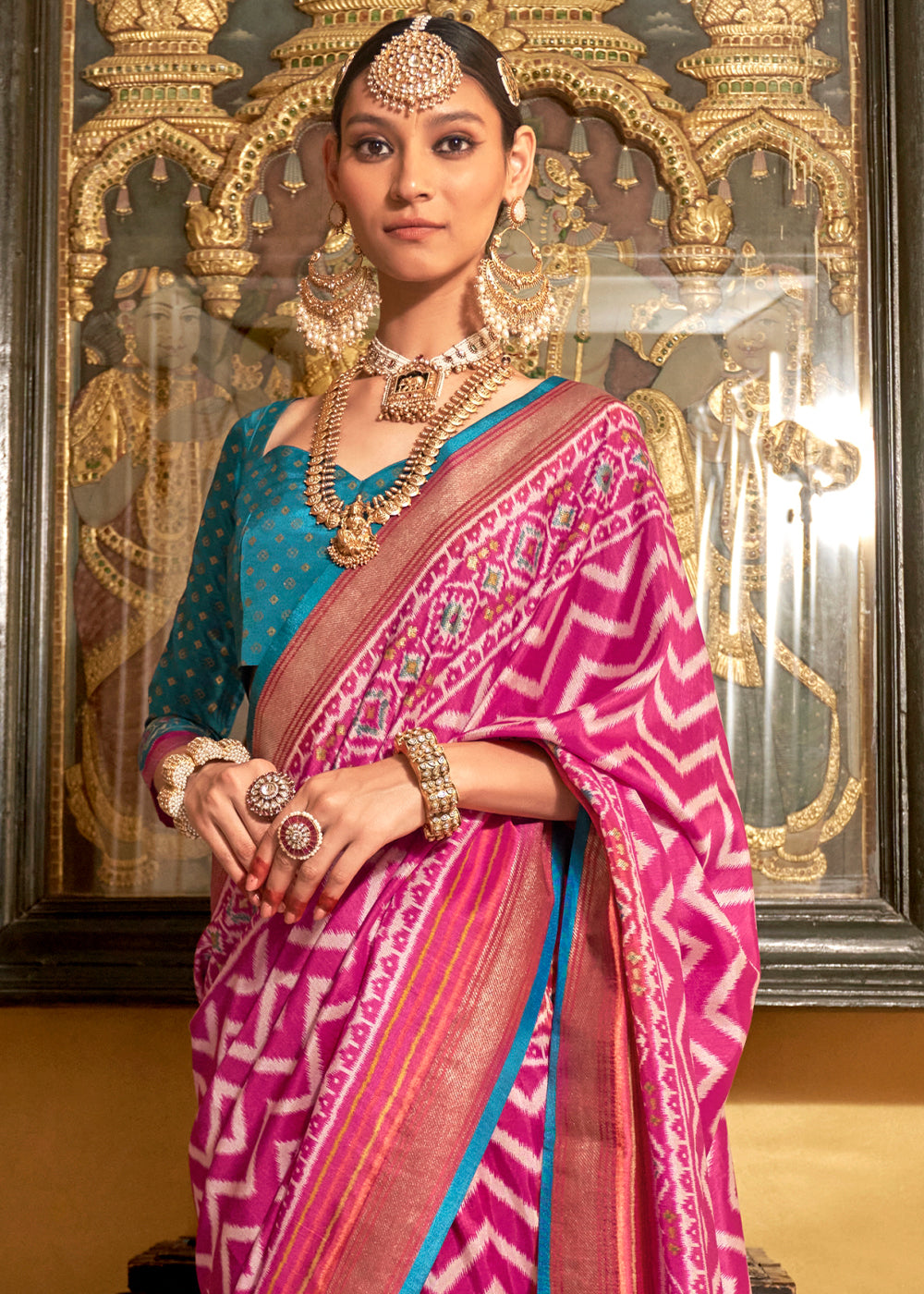 Gorgeous silk saree with intricate pink and gold patterns