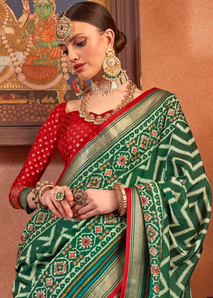 Beautiful-silk-saree-in-dark-green-with-contrasting-blouse