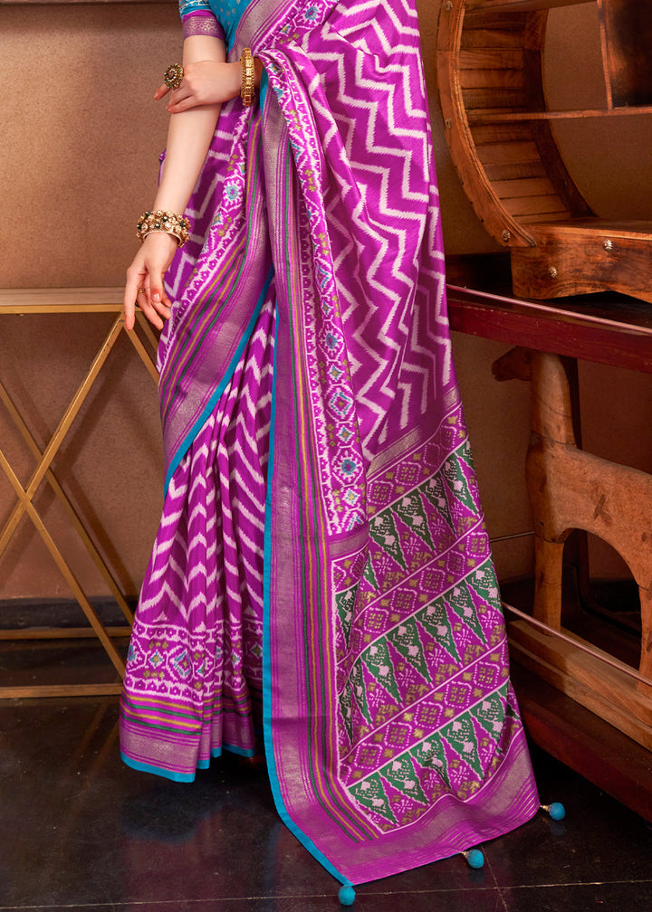 Fandango Purple silk saree with intricate patola print and contrast blouse