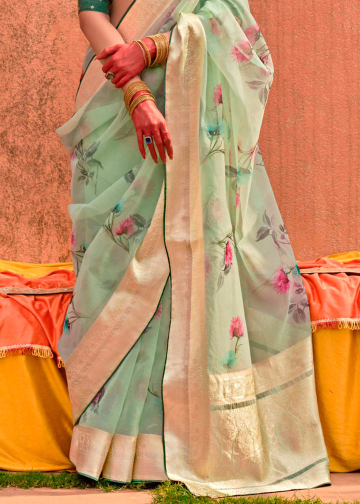 Beautiful light green floral printed designer organza silk saree with intricate detailing