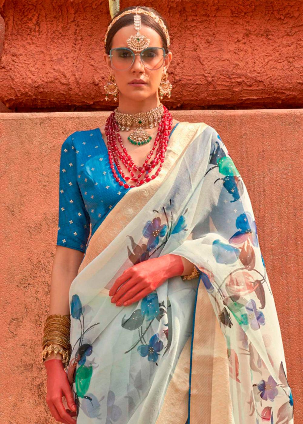  Elegant and stylish powder blue organza silk saree with intricate floral print design