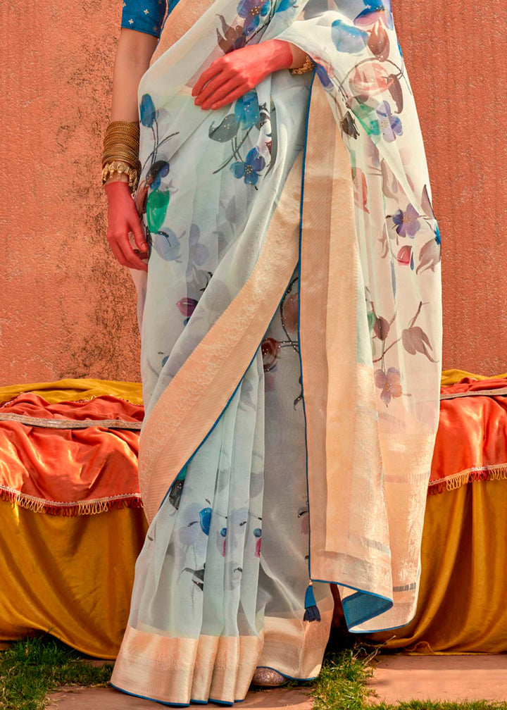  Exquisite powder blue saree made from designer organza silk with floral print