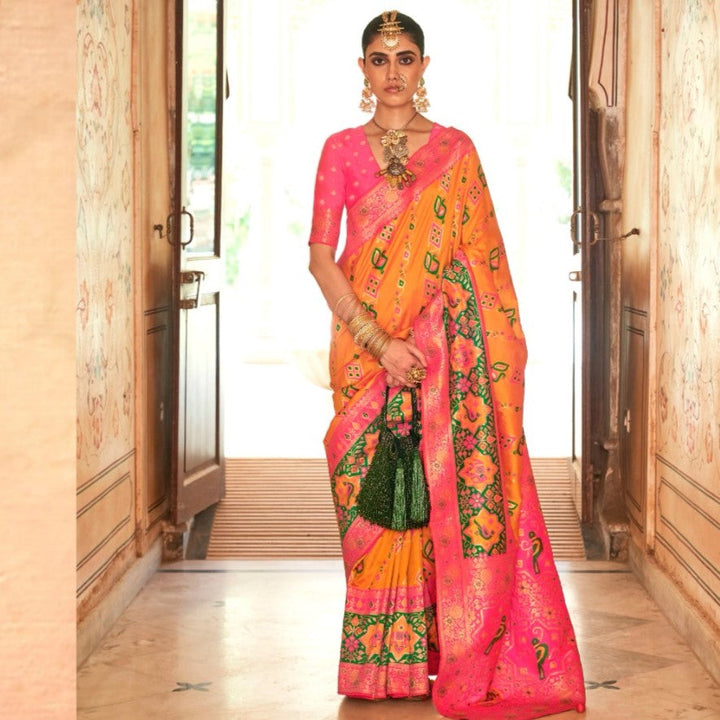 Pastel Orange Peacock Motif Banarasi brocade Reception Saree With Contrast Border