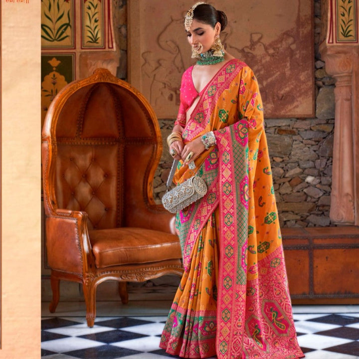 Rusty Orange Peacock Motif Banarasi brocade Reception Saree With Contrast Border