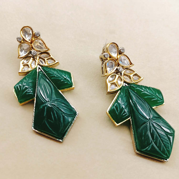 Diya Green Rhodium Plated Carved Stone Kundan Earrings