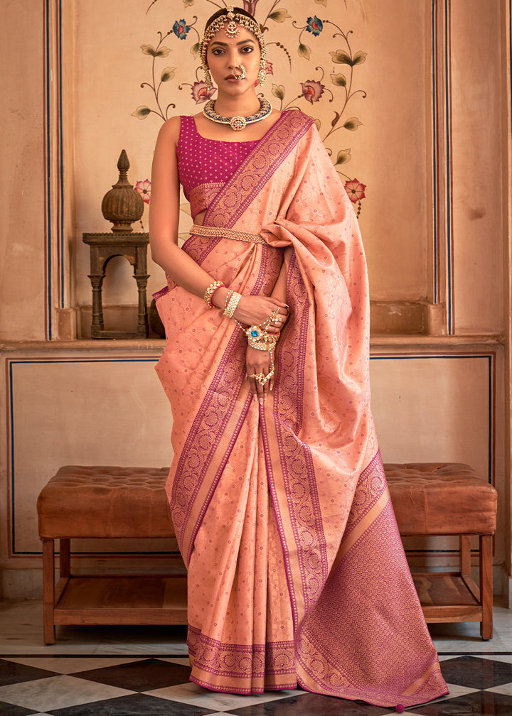 Light Peach Pink Zari Woven Banarasi Silk Saree with intricate floral patterns