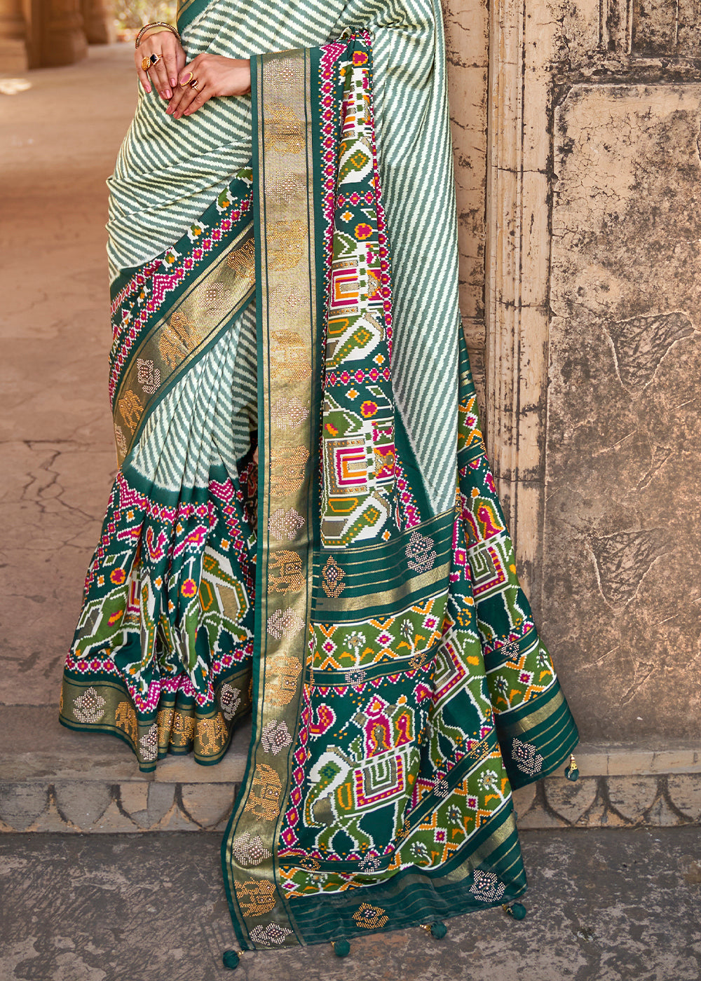 Dark Green Designer Patola Silk Saree with Zari Border & Stone work - qivii