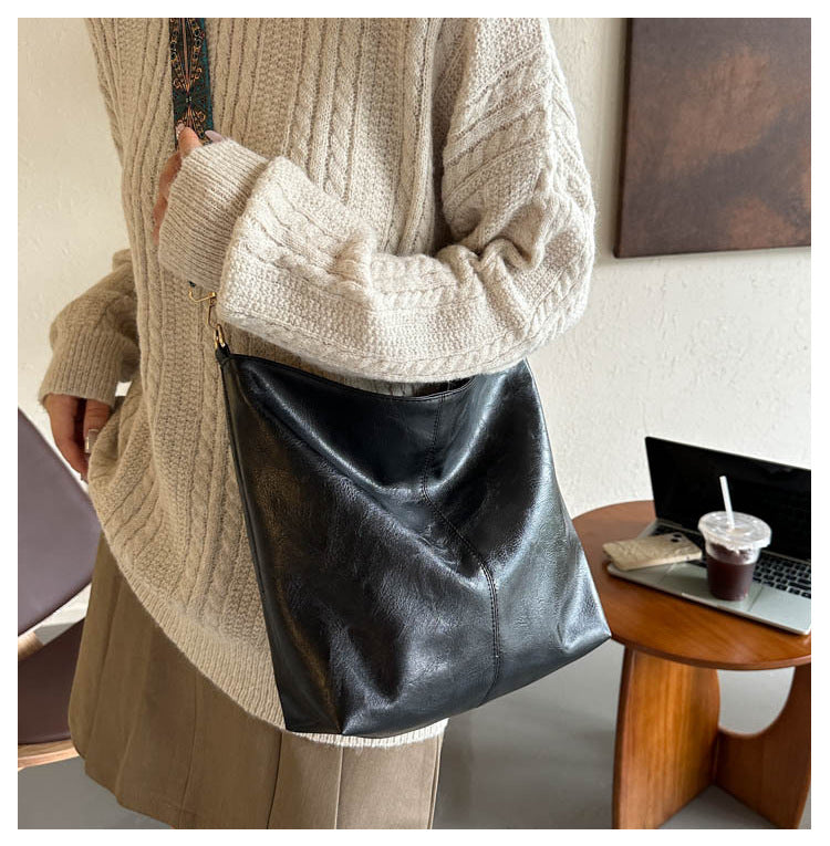 Women's Convertible Crossbody Bucket — Monochrome PU Carryall with Artisan-Embroidered Strap