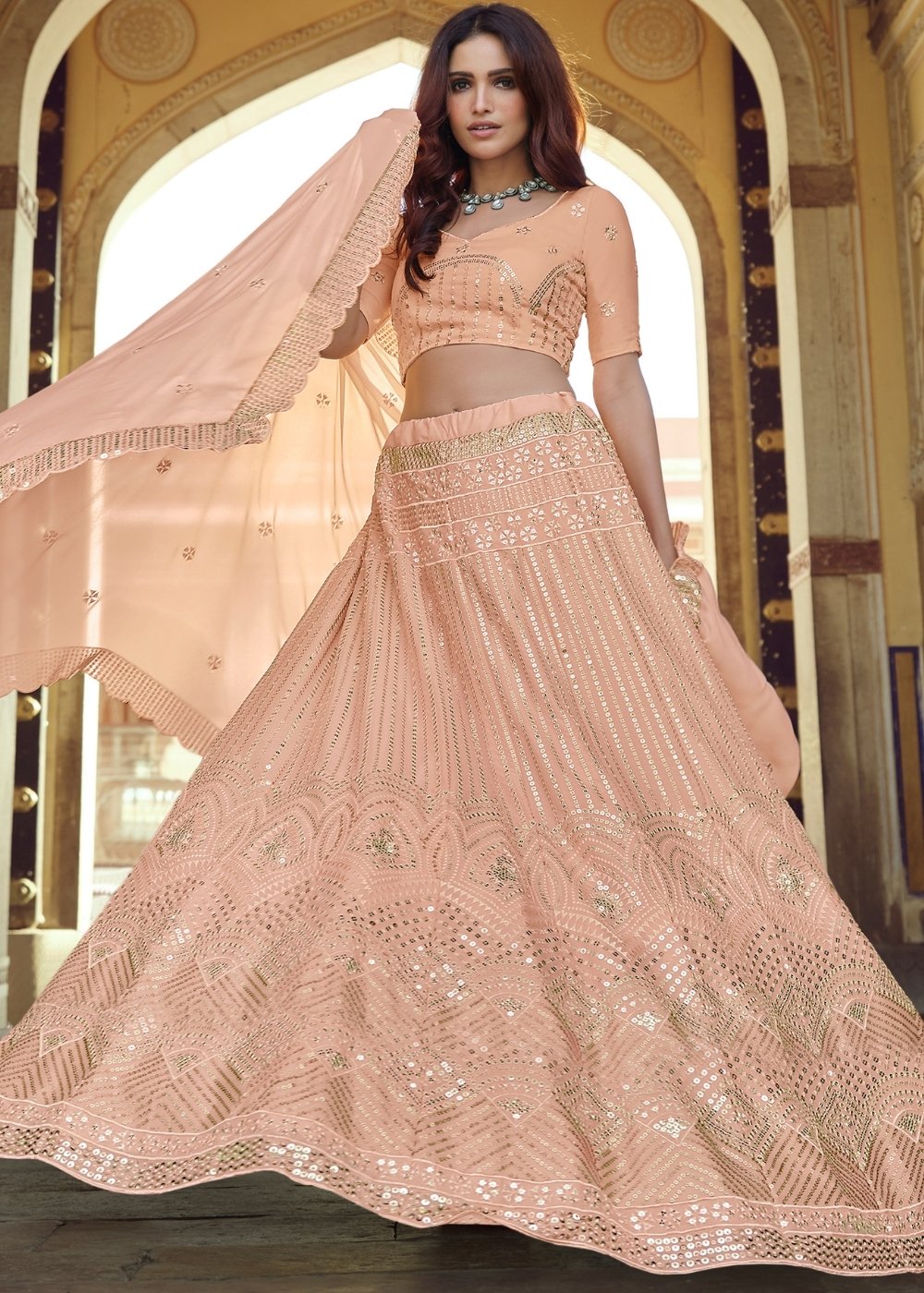 Stunning back view of the Peach Pink Georgette Lehenga Choli with Sequins & Thread work, displaying the flattering cut and intricate embellishments