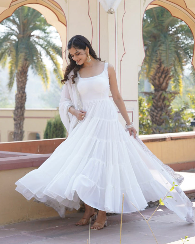 Designer white georgette floor-length gown with frill details and matching dupatta by Qivii, perfect for special occasions and events