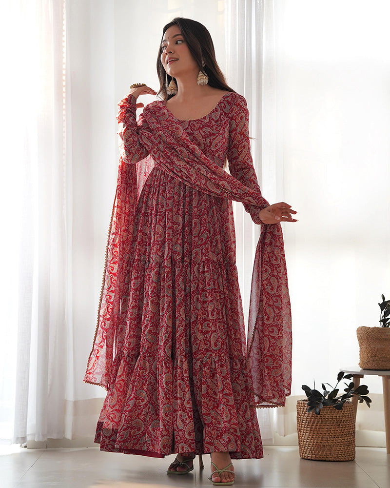 Beautiful ethnic three-layered Anarkali suit in maroon with Kalamkari print