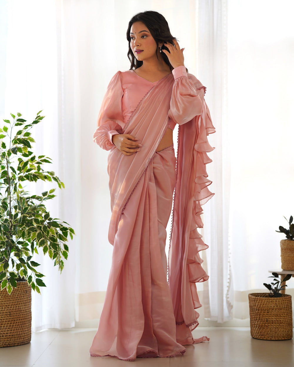 Peach color ready to wear saree with elegant ruffle details