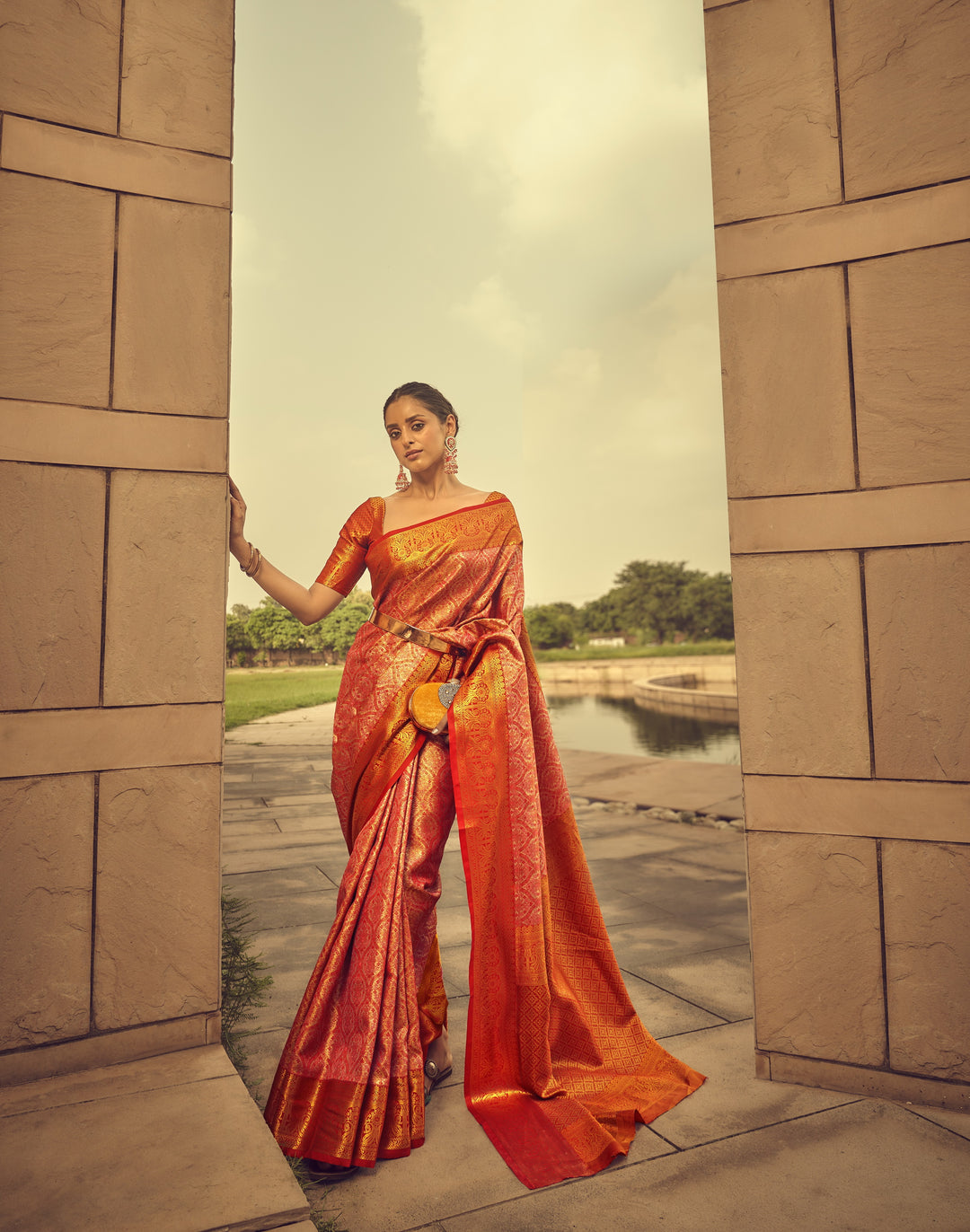 Orange Shade Banarasi Silk Weaved Zari Traditional Saree