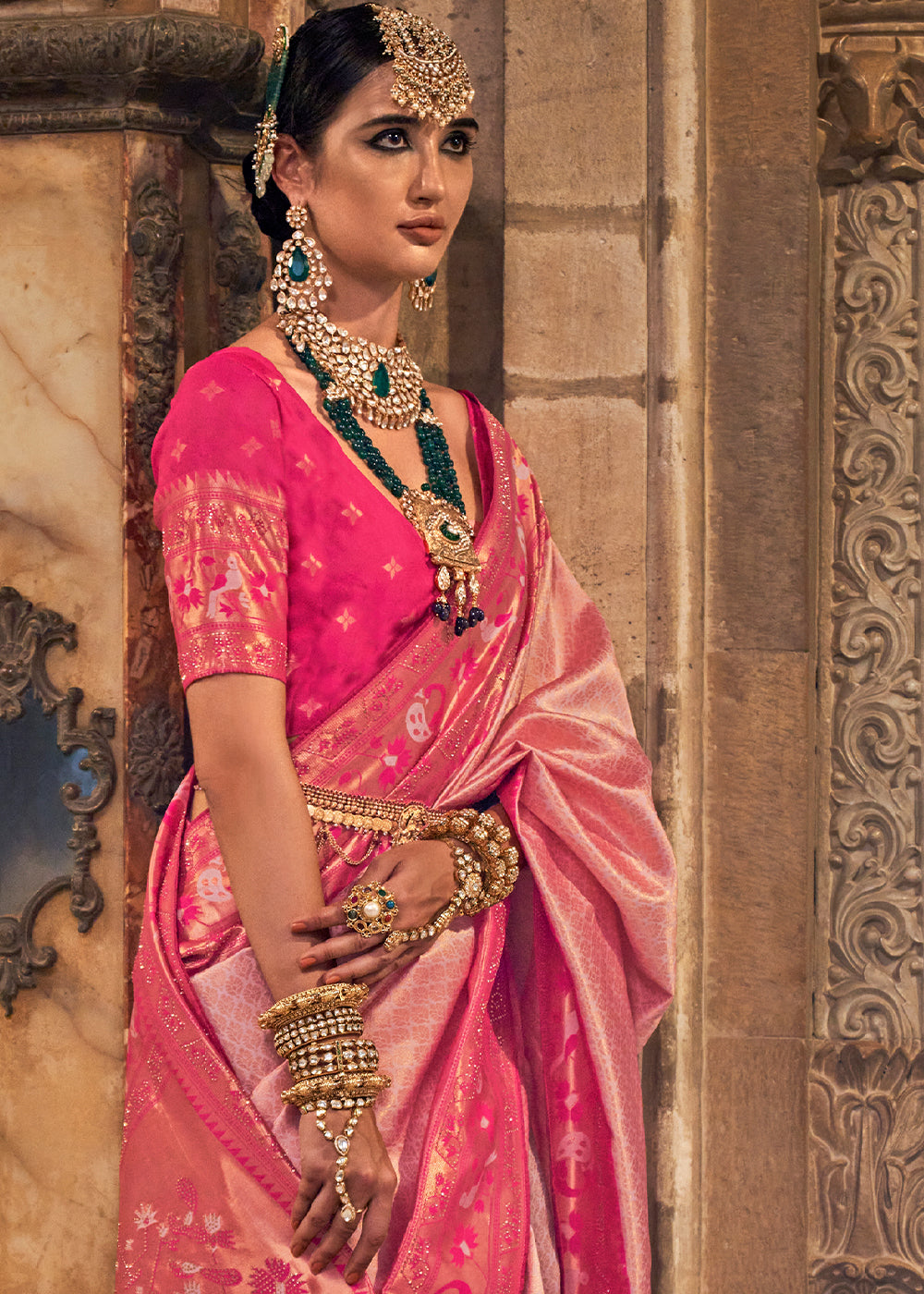 Beautiful traditional Indian Banarasi silk saree in shades of pink with intricate stone work