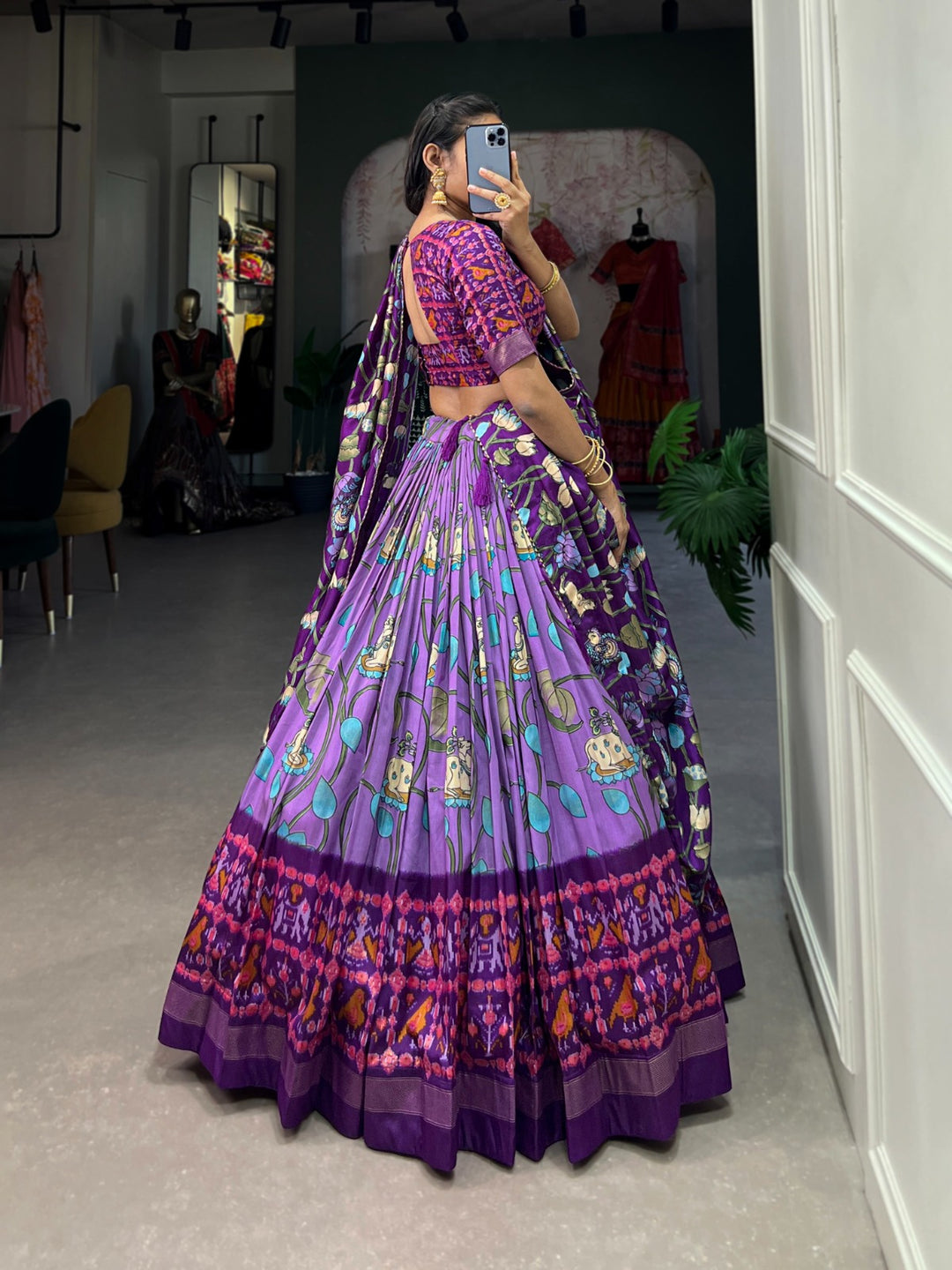 Traditional Indian ethnic wear in lavender and multicolor hues, featuring intricate patterns and high-quality silk fabric