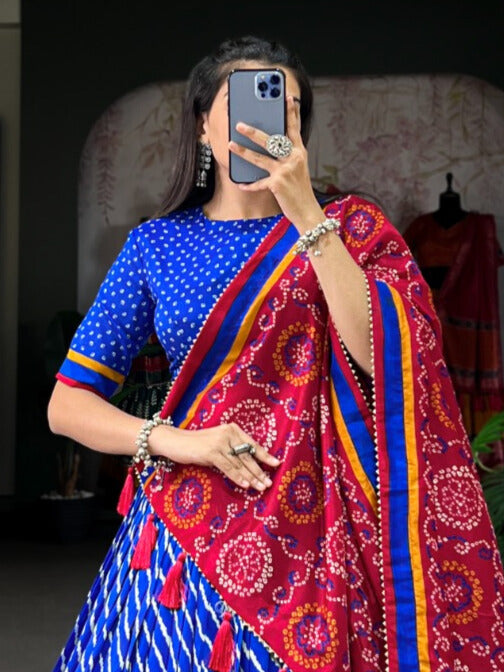 Royal Blue Tussar Silk Leheriya With Patola Print Border, showcasing intricate handcrafted designs and vibrant color combination, perfect for traditional occasions and celebrations 