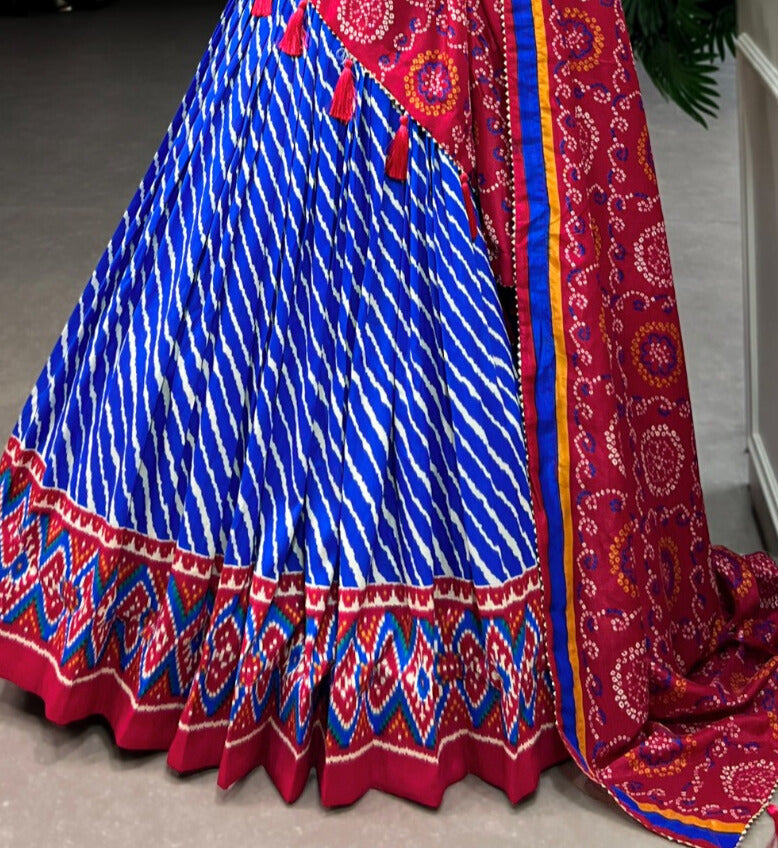  Exquisite Royal Blue Tussar Silk Leheriya With Patola Print Border, a blend of rich heritage and contemporary fashion, ideal for making a statement at cultural events and festivities