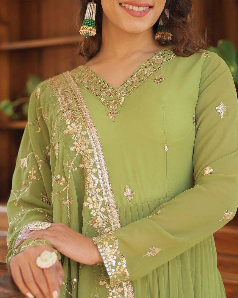  Beautiful parrot green color faux georgette designer anarkali gown with dupatta by Qivii, featuring a traditional and modern fusion