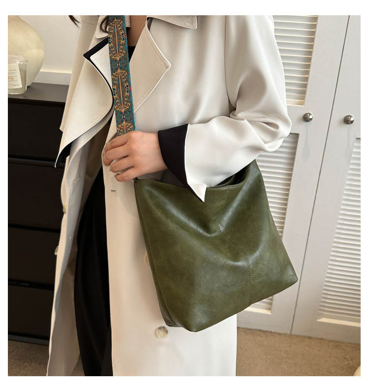 Women's Convertible Crossbody Bucket — Monochrome PU Carryall with Artisan-Embroidered Strap