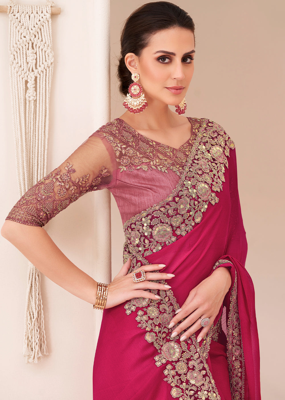  Woman wearing Ruby Pink Designer Embroidered Satin Chiffon Saree with elegant drape and flowing chiffon fabric