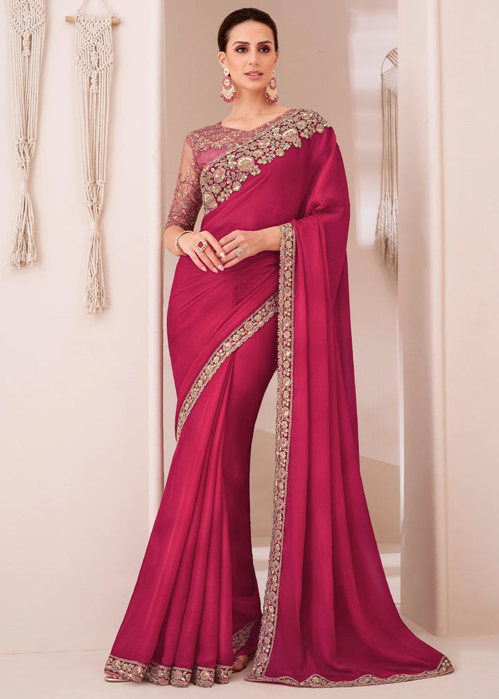 Close-up of Ruby Pink Designer Embroidered Satin Chiffon Saree with intricate floral patterns and golden thread work