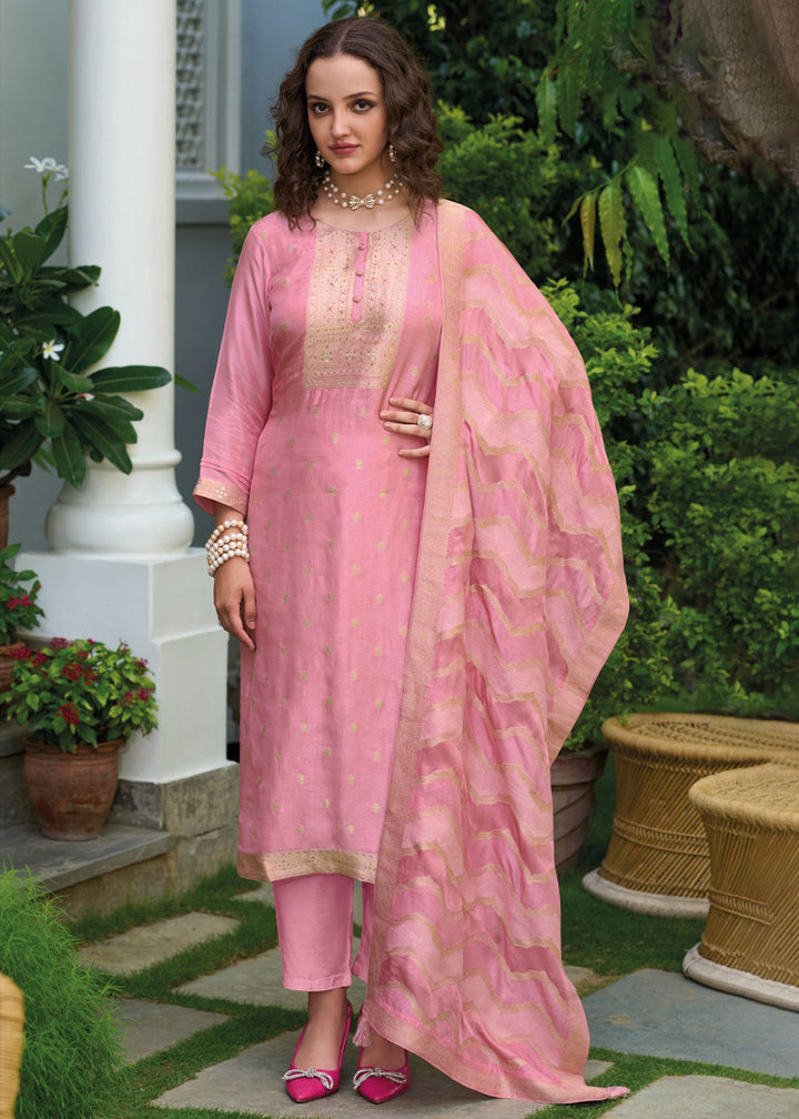 Creamy Pink Viscose Dola Silk Jacquard Kurta . Paired with Santoon Trouser and Viscose Dola Jacquard Dupatta