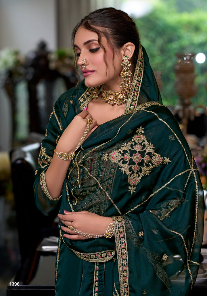 Green soft organza with embroidery heavy silk salwar suit