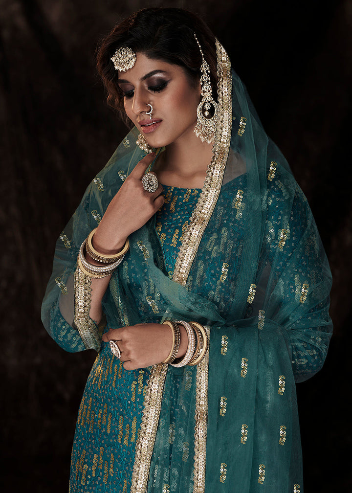 Dark Firozi Blue Designer Soft Net Sharara Suit with Sequin work By Qivii