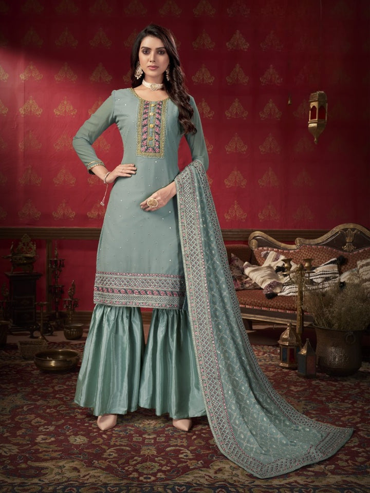 BLUE FAUX GEORGETTE WITH SLEEVES FABRIC ATTACHED SALWAR SUIT