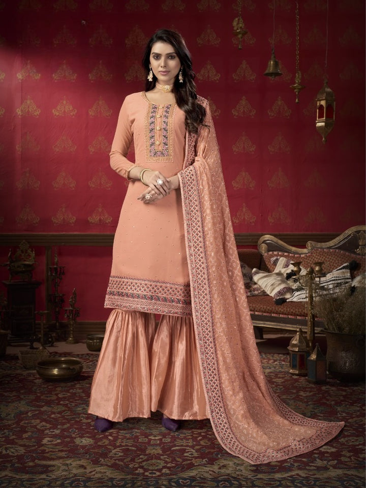 PEACH FAUX GEORGETTE WITH SLEEVES FABRIC ATTACHED SALWAR SUIT