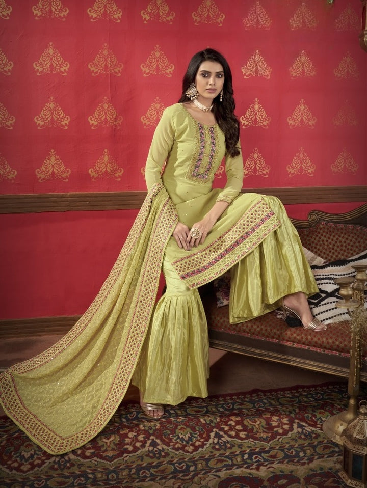 GREEN FAUX GEORGETTE WITH SLEEVES FABRIC ATTACHED SALWAR SUIT