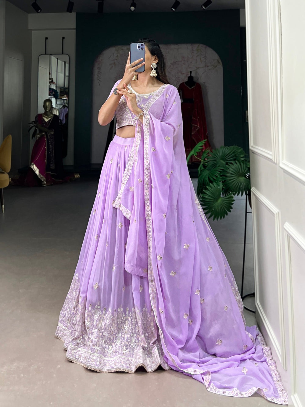 Lavender color Georgette sequins and thread embroidery work lehenga with intricate design