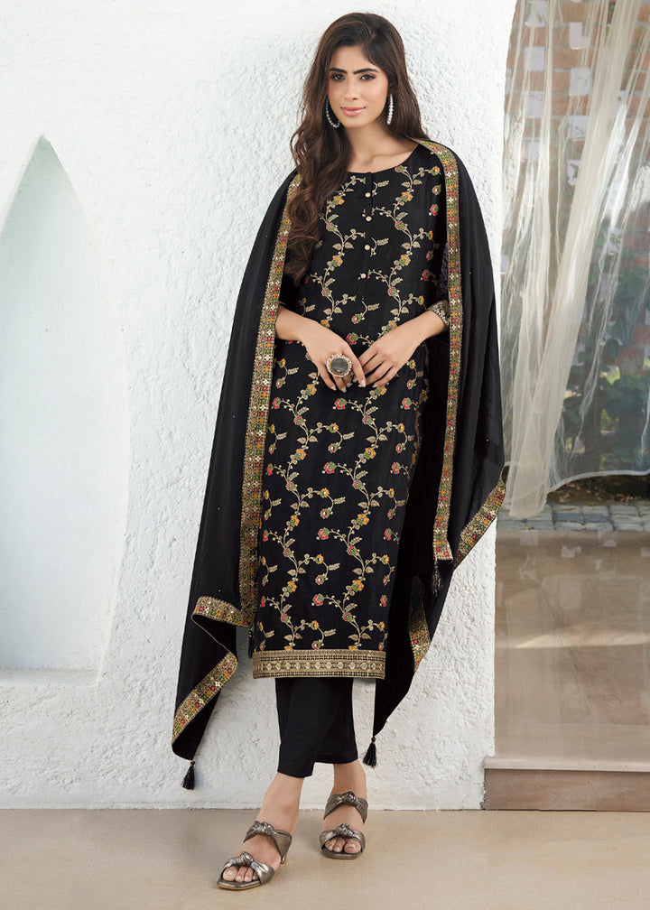 Black Dola Silk Jacquard Kurta . Paired with Santoon Trouser and Chinon Dupatta