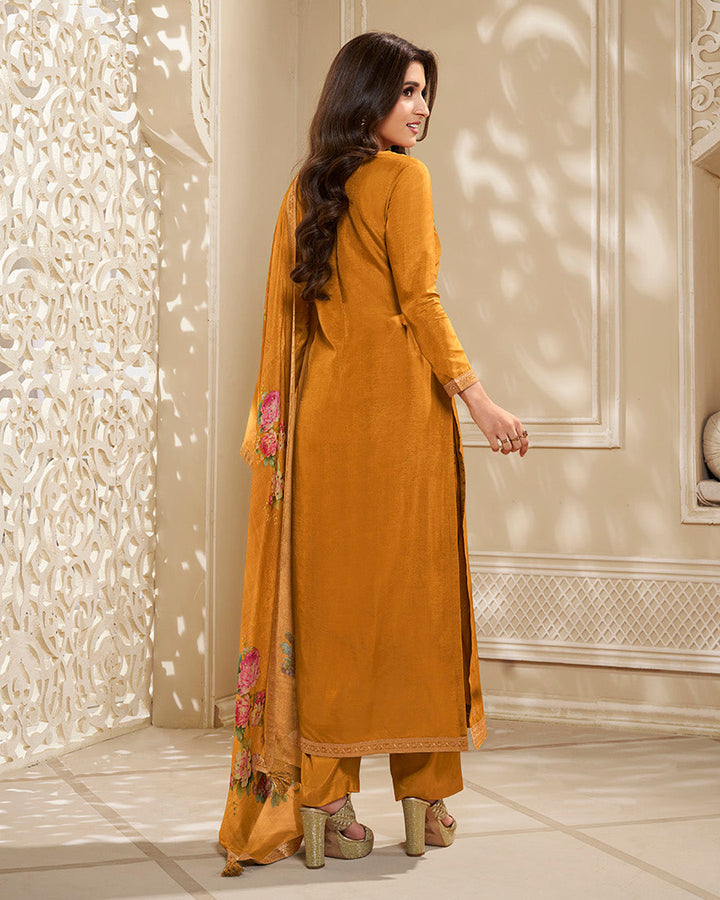 Yellow Ochre Dola Silk Kurta. Paired with Santoon Straight Pants and Chinon Floral Printed Dupatta.