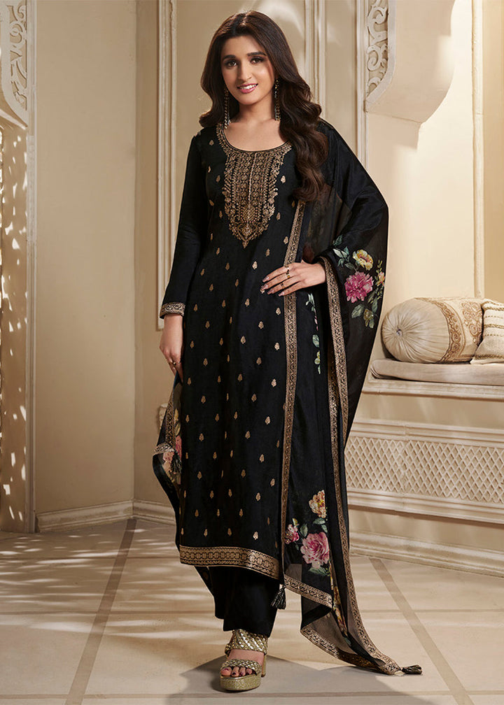 Charcoal Black Dola Silk Kurta . Paired with Santoon Straight Pants and Chinon Floral Printed Dupatta.