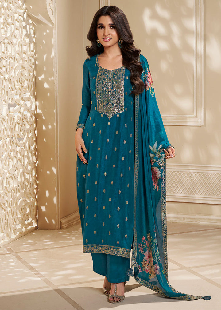 Cerulean Blue Dola Silk Kurta . Paired with Santoon Straight Pants and Chinon Floral Printed Dupatta.