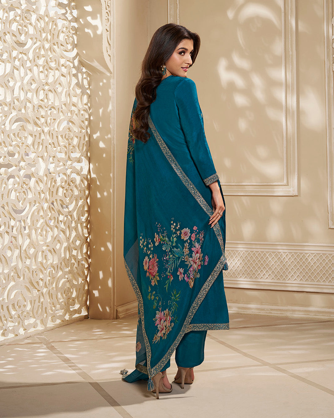 Cerulean Blue Dola Silk Kurta . Paired with Santoon Straight Pants and Chinon Floral Printed Dupatta.