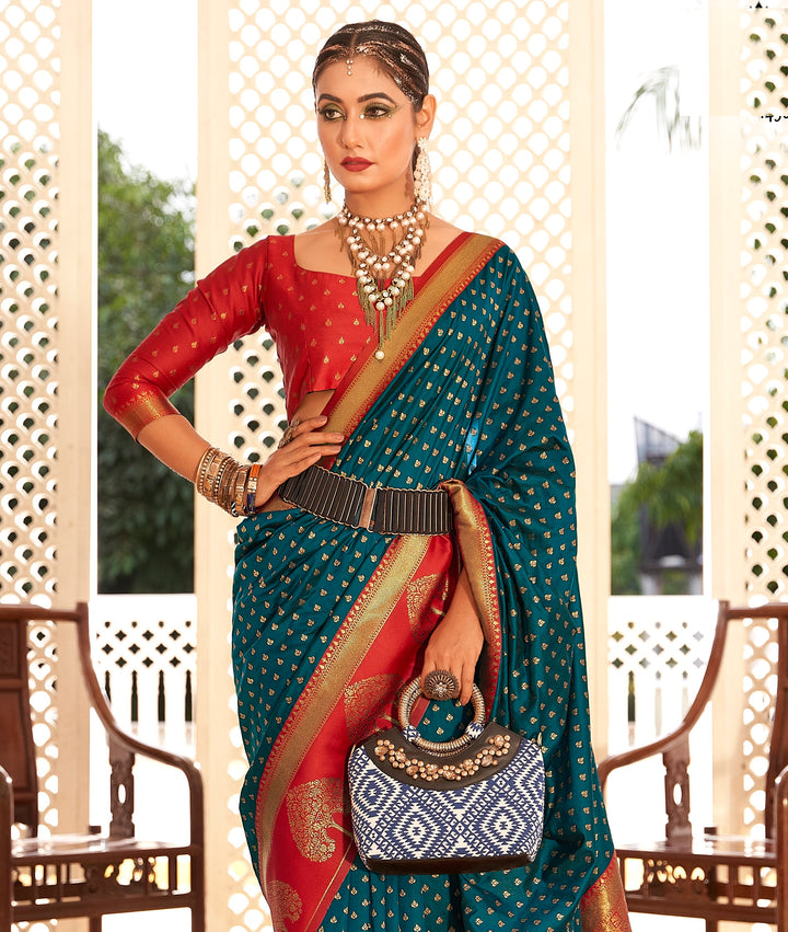 Teal Blue Soft Banarasi Paithani & Enhanced With Copper Zari Weaving & Rich Pallu Contarst Border