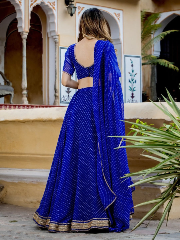 Stunning leheriya print lehenga with detailed blue georgette fabric